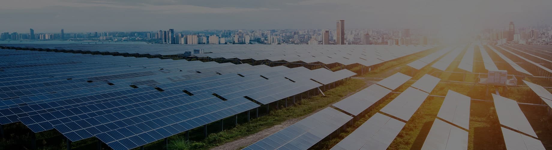 Solar Panels In An Industrial Open Field